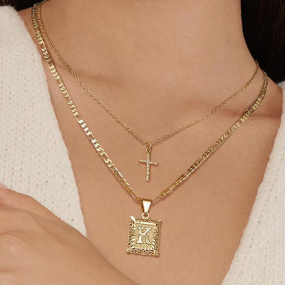 Cross Initial Set Collane | Oro