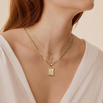 Cross Initial Set Collane | Oro