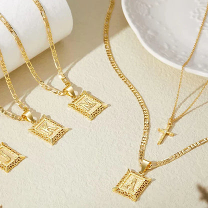 Cross Initial Set Collane | Oro