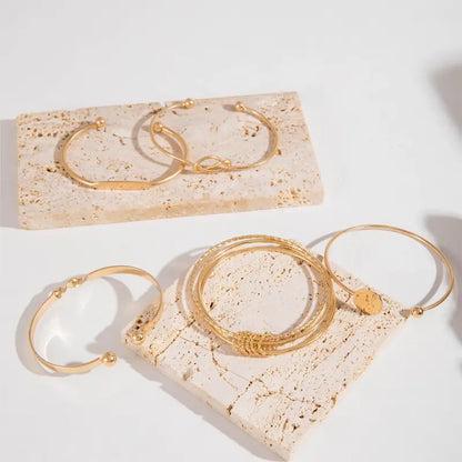 Knotted Elegance Set Bracciali | Oro