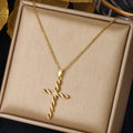 Cristallo Twist Cross Collana | Oro