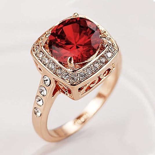 Rubino Halo Statement Anello | Rose Oro