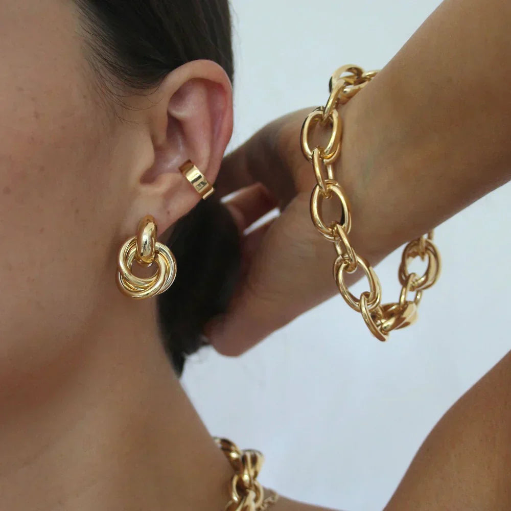 Statement Interlocking Orecchini | Oro