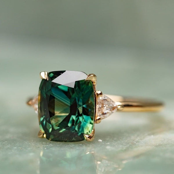 Oro Smeraldo Solitaire Anello