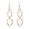 Spiral Dangle Orecchini | Oro